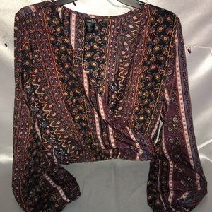 Cross Draped plunging patterned top